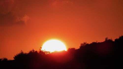 Gratis lagerfoto af bakke, rød, rød solnedgang