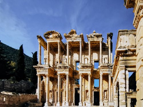 Free Breathtaking facade of the ancient Library of Celsus in Ephesus, Turkey, against a clear blue sky. Stock Photo
