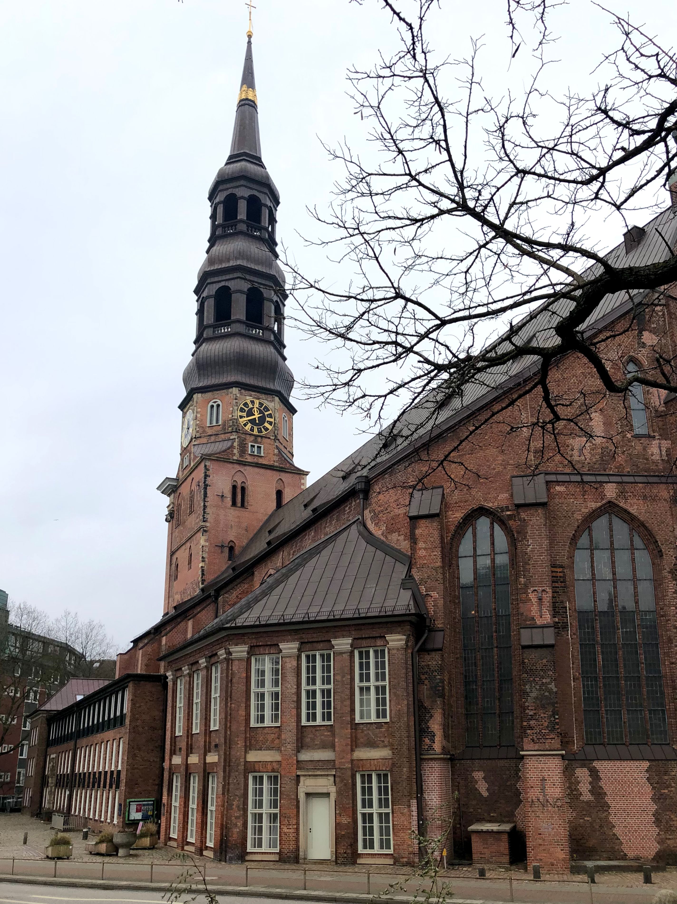 St. Catherine's Church, a Gothic landmark in Hamburg, captured on a cloudy day.