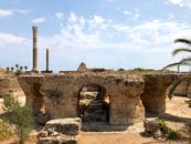 Explore the ancient Roman ruins of the Baths of Antoninus in Carthage, showcasing architectural grandeur.