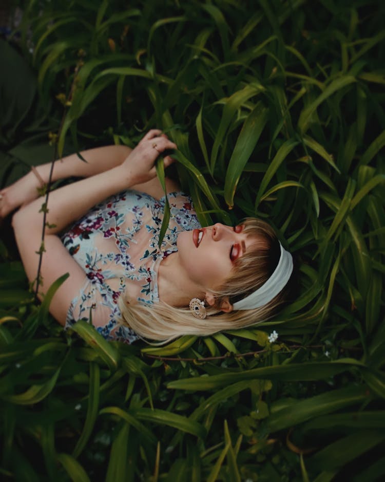 Woman Lying Among Leaves