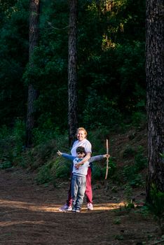 A mother and son working on a project together to illustrate mother son relationship advice.
