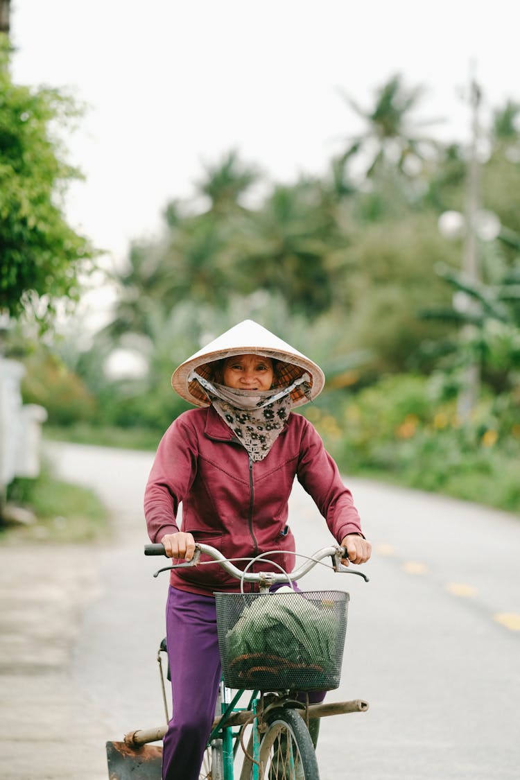 Woman On Bicycle On Road