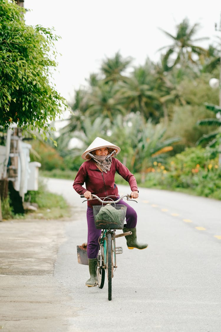 Woman On Bicycle On Road