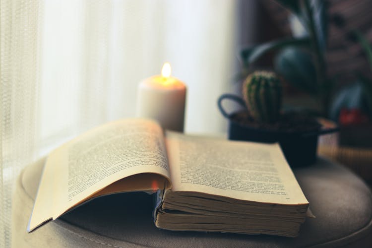 Old Book With Candle