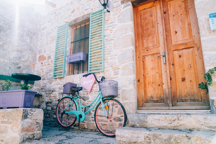 A Bicycle Parked Outside The House