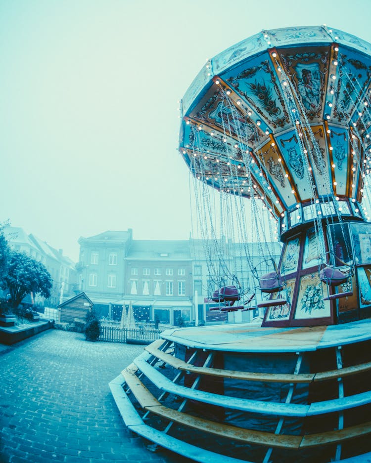 Swing Carousel Near Buildings