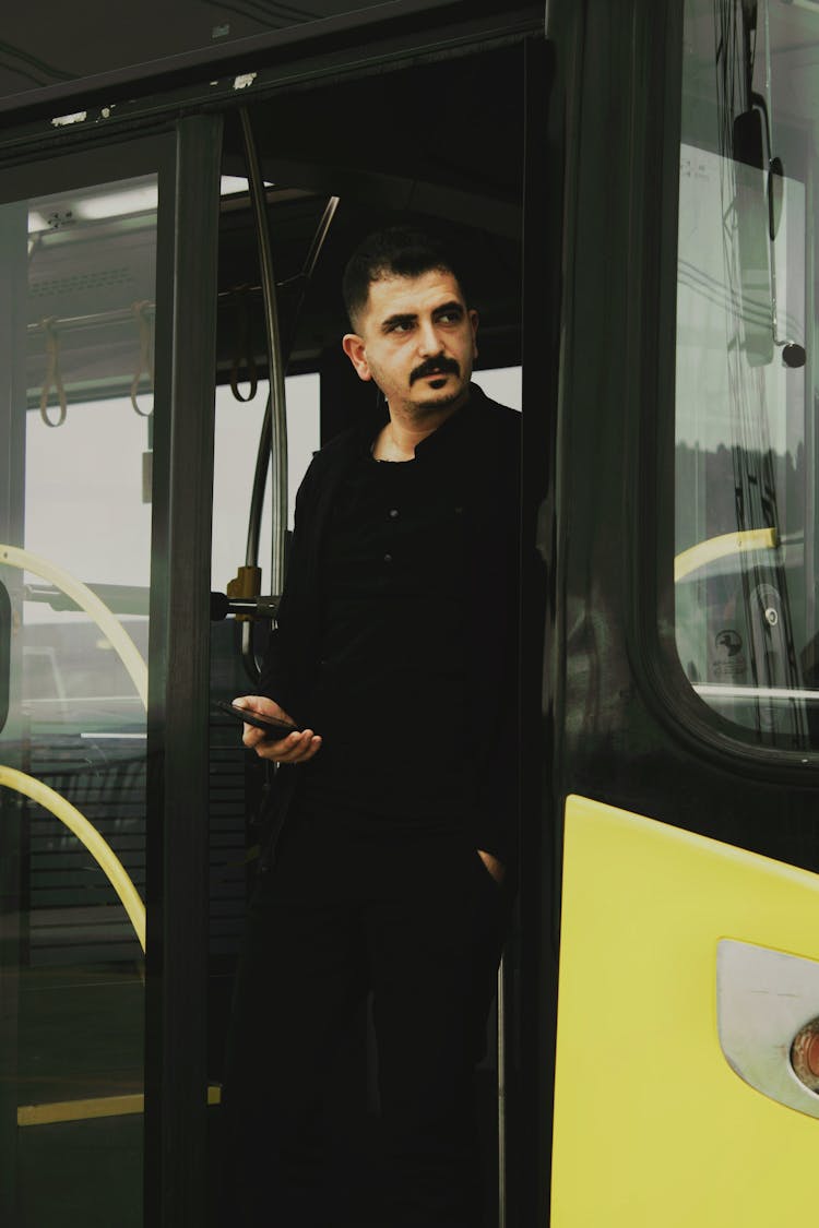 Man Walking Out Bus