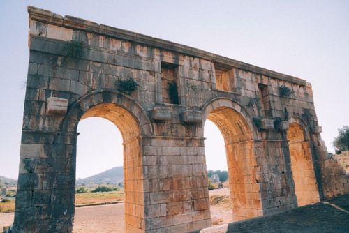 Free Explore the majestic ancient Roman arches in Patara, Turkey under a clear sky. Stock Photo