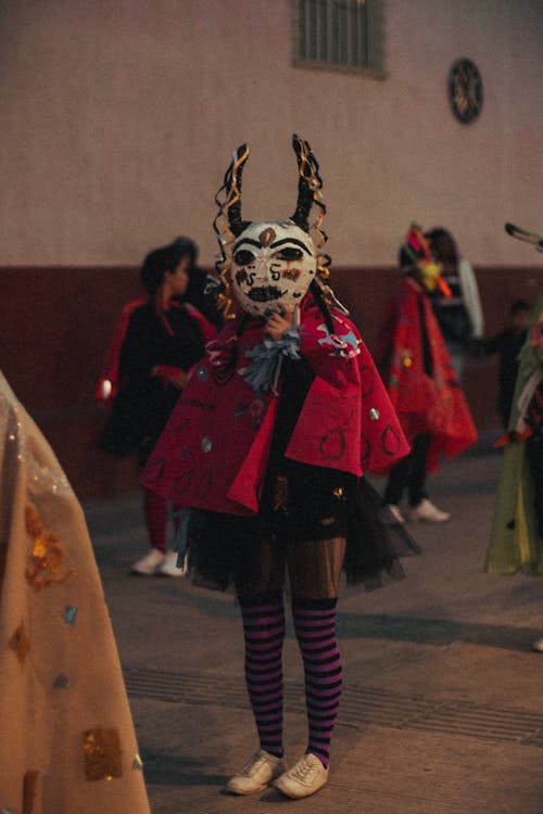 Person in Colorful Clothes in Festival