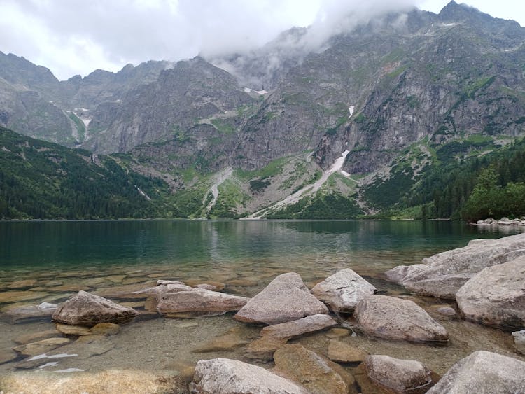 A Morskie Oko Lake Near The Mountain Under The Cloudy Sky