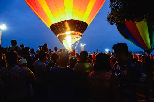 Group of People Gathered Near Hot Air Balloon