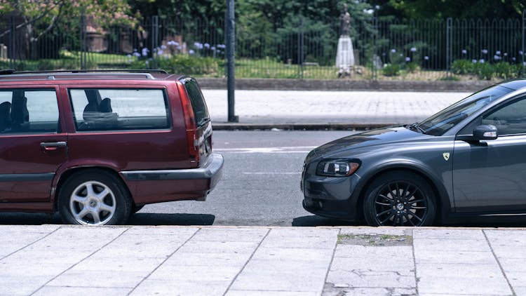 Cars Parked On Road 