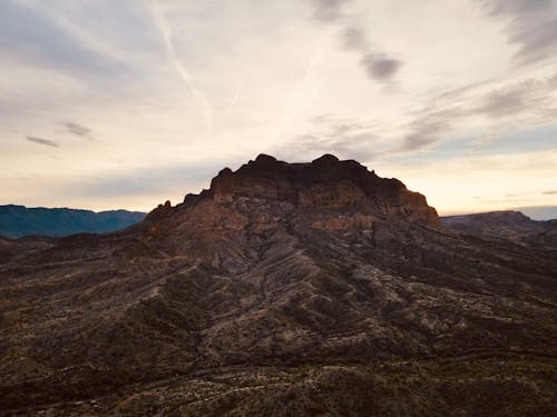 Rock Mountain Under Gray Sky