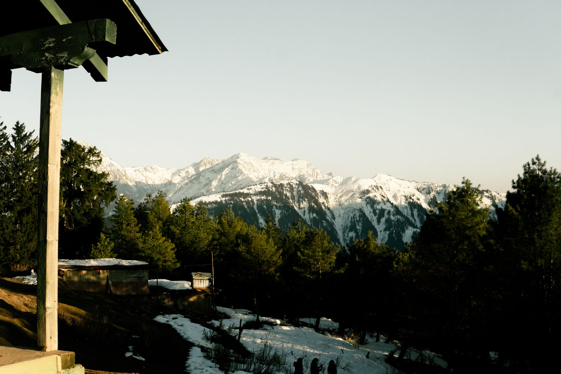 Stunning view of snow-capped mountains and forests in Kaghan Valley, Pakistan.