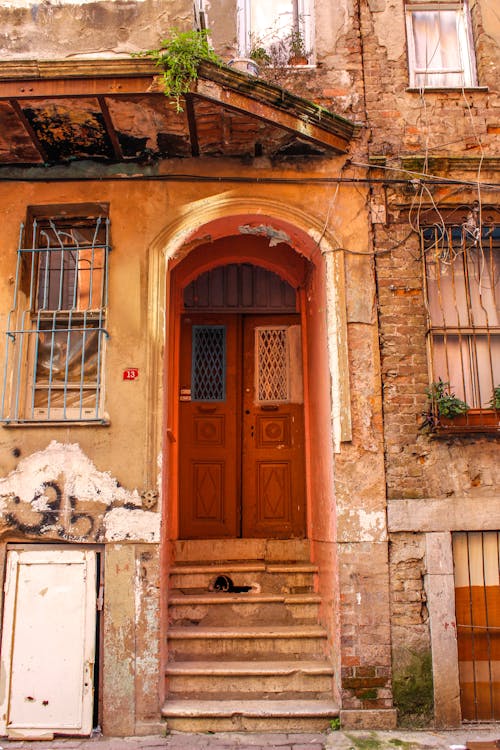 Wooden Doors in Entrance to Abandoned Townhouse