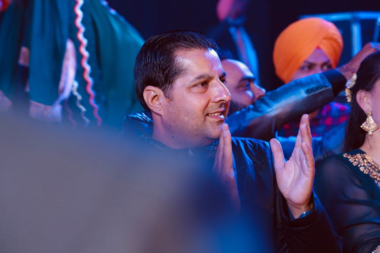 A Man Clapping His Hand