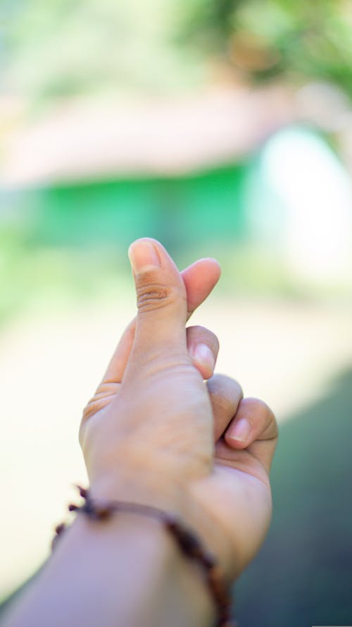 Hand Making a Finger Heart Gesture