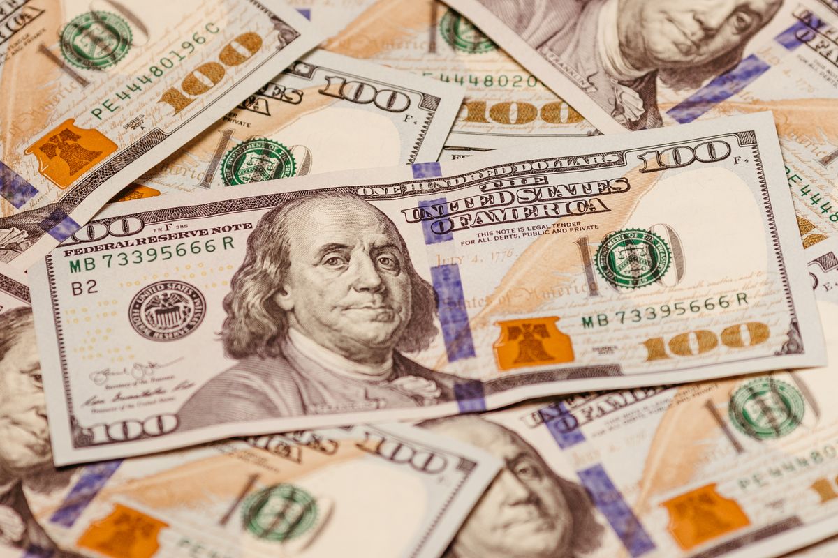 Stacks of cash banknotes for law firm litigation funding