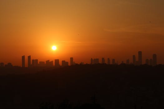 A breathtaking silhouette of Istanbul's skyline during a warm sunset.