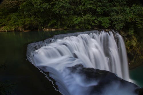 Majestic High Waterfall in the Forest