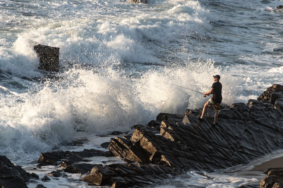 Experience the Thrill! Angling Adventures Await by the Shore in Digha Beach, West Bengal. Dive into Fishing Fun Today!