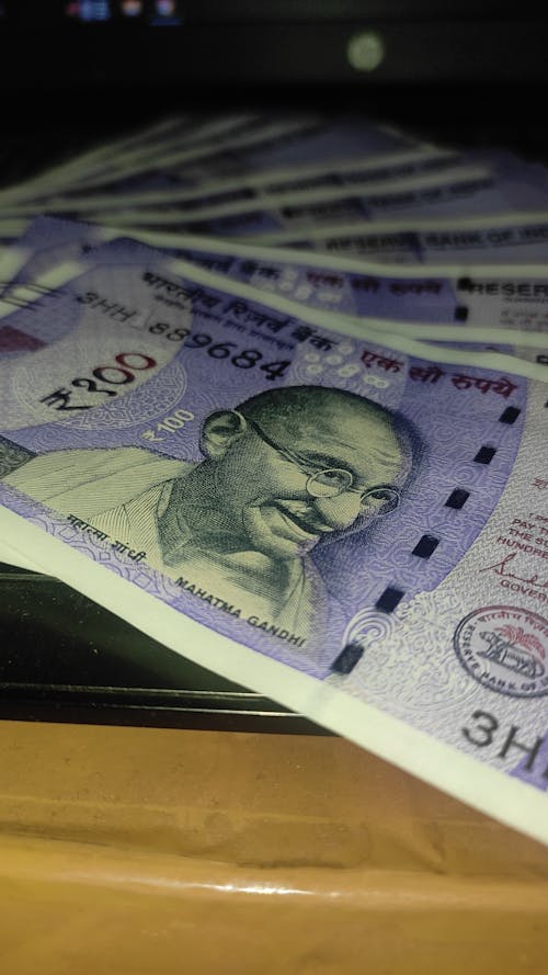 Foto profissional grátis de mahatma gandhi, moeda indiana, nota indiana de cem rúpias