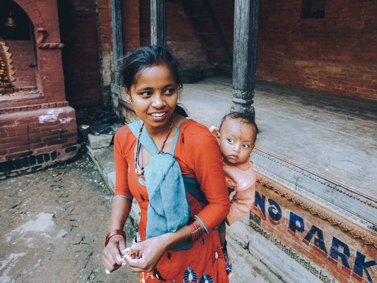 Mother Holding Child