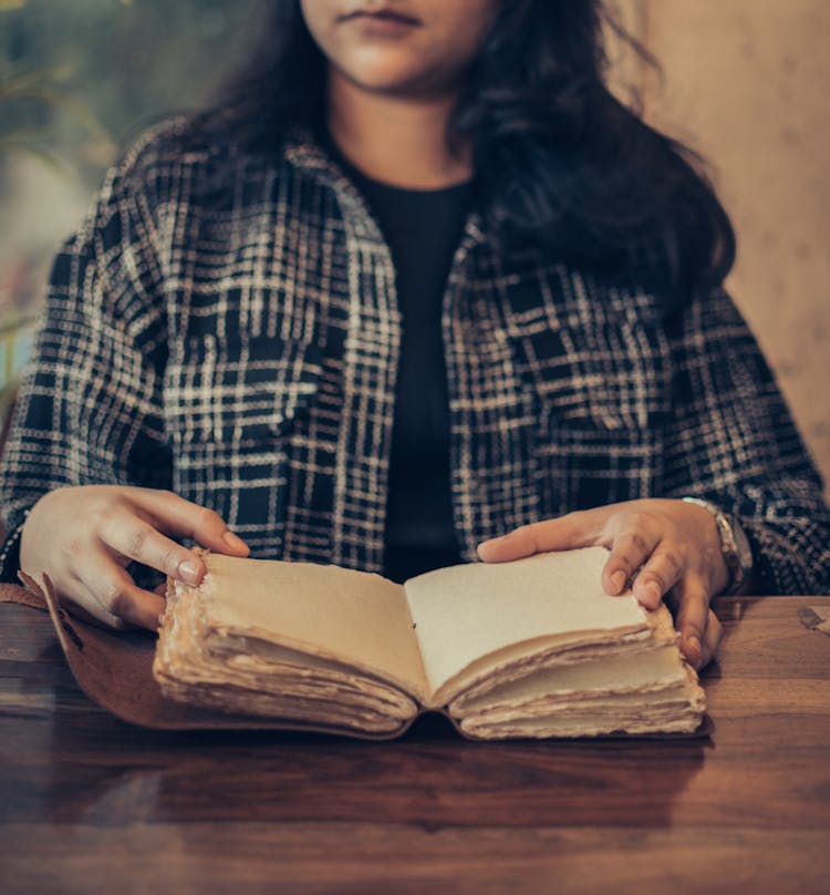 Woman With Book With Blank Pages