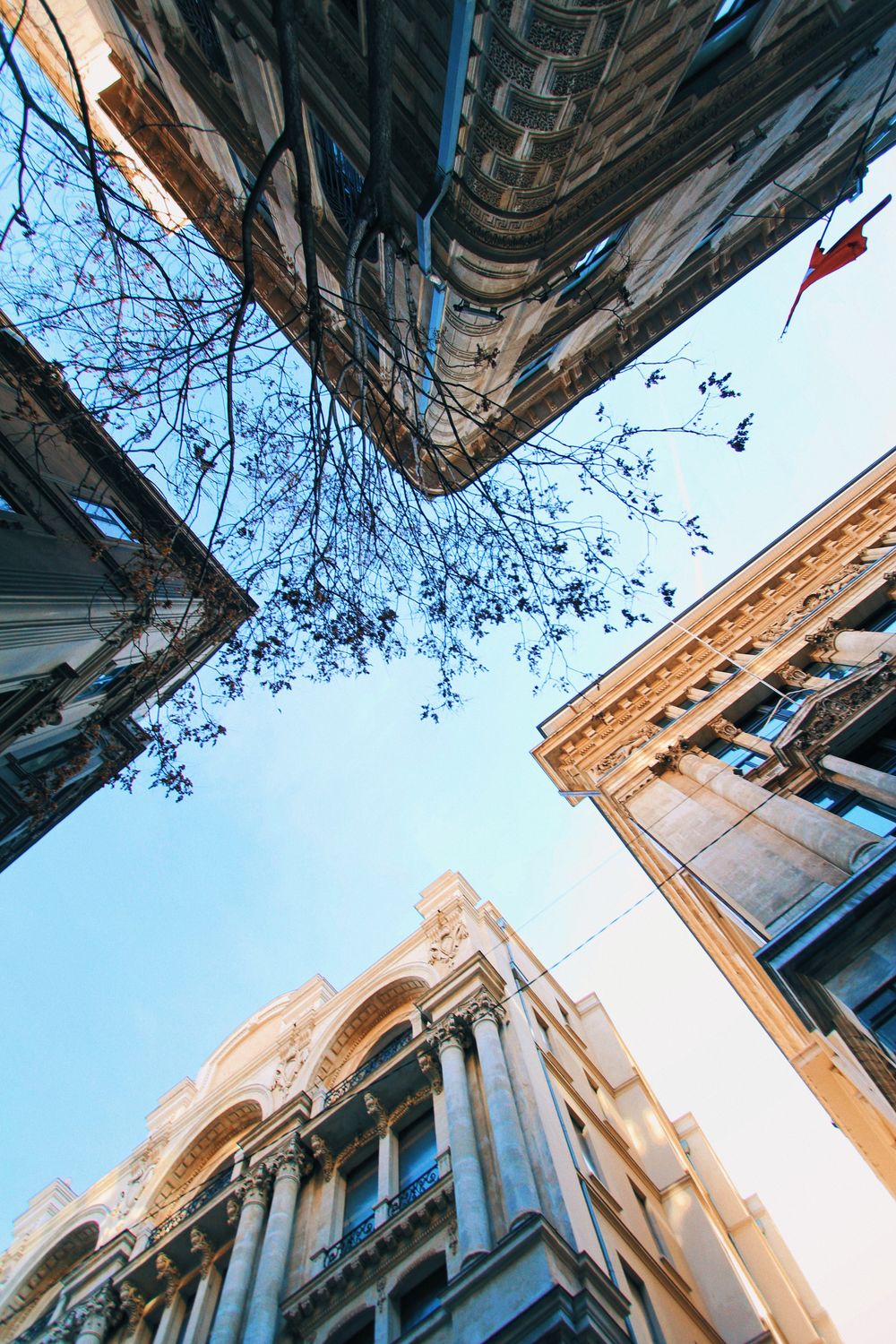 A view of buildings from below looking up · Free Stock Photo