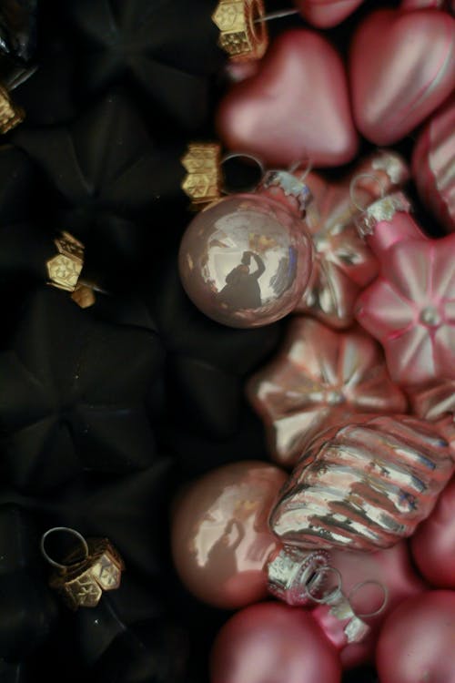 Close-up of Pink and Black Christmas Baubles 