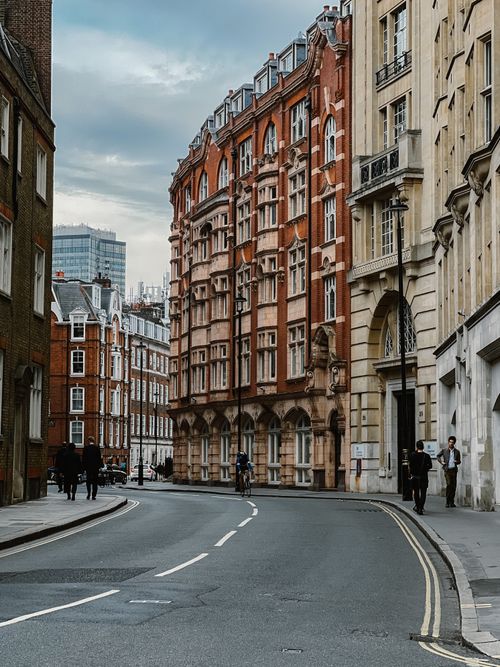 Free Historic street with beautiful architecture and urban charm in a vintage city setting. Stock Photo