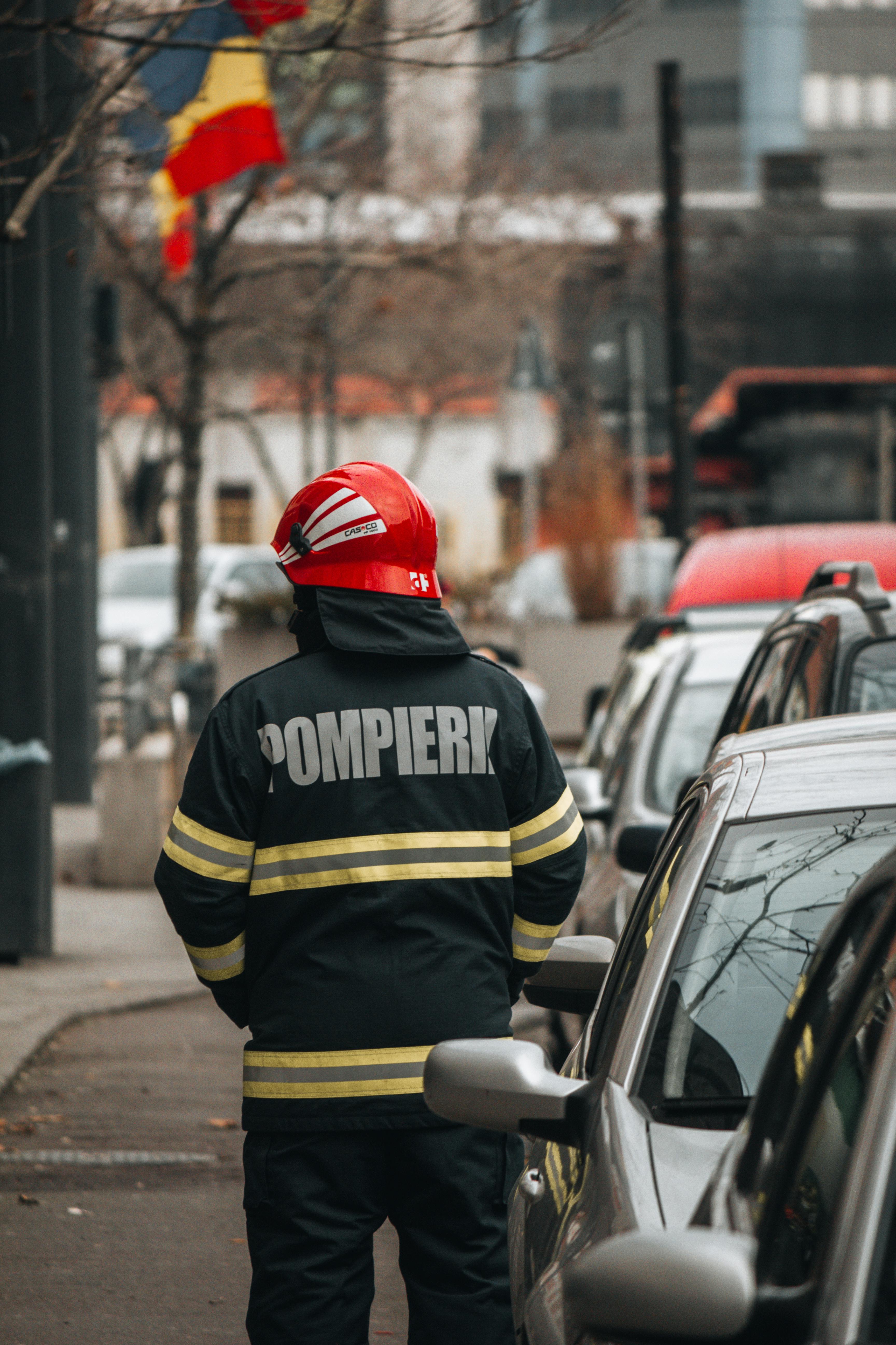 Chimney Smoke behind Standing Man · Free Stock Photo