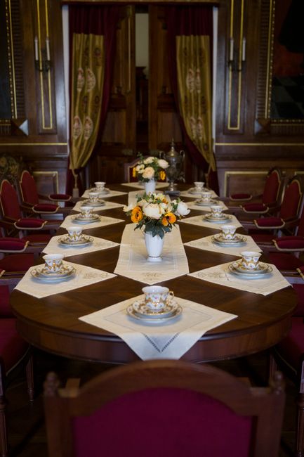 Luxurious dining room setup with vintage decor and floral arrangements. - Historic Dining: Best Plantation House Restaurants in Barbados