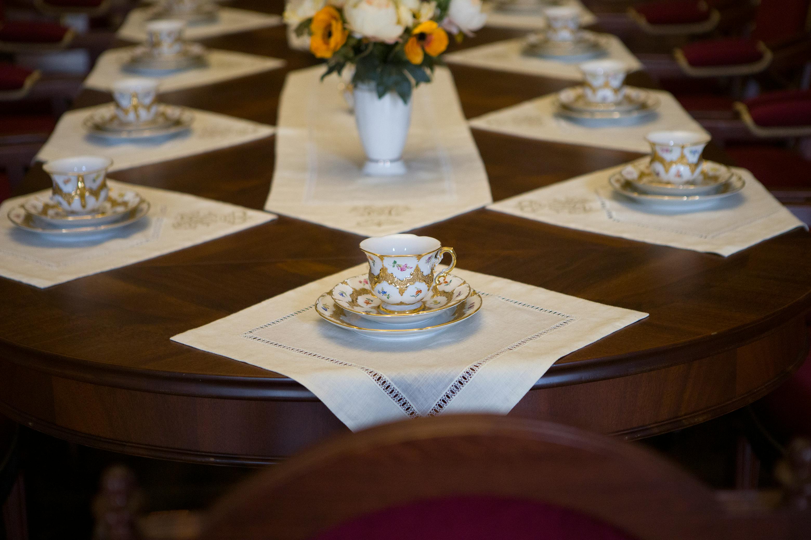 fancy floral teacups on saucers