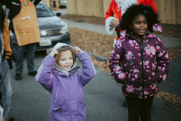 Little Girls On A Christmas Event In City 