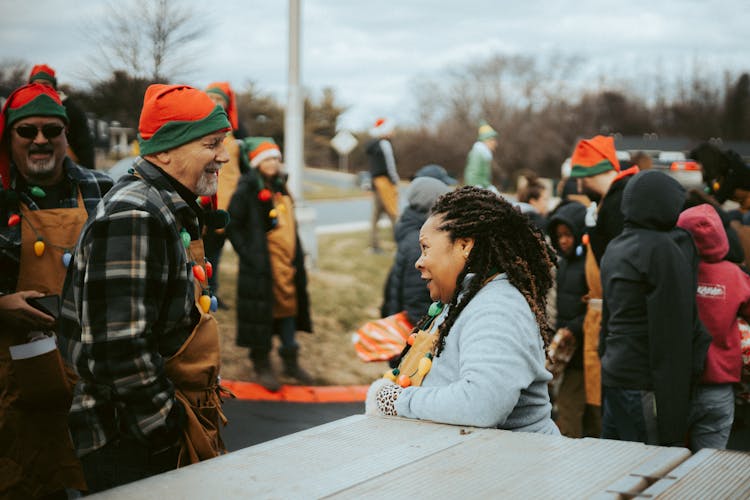 People In Christmas Costumes On An Event In City 