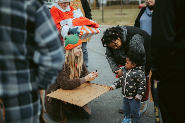 People On A Christmas Event In City 