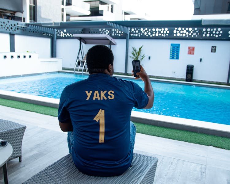 Man Taking A Selfie Near The Pool