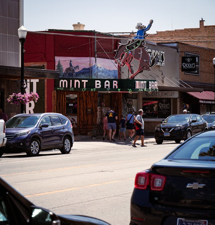 People Walking Near Mint Bar