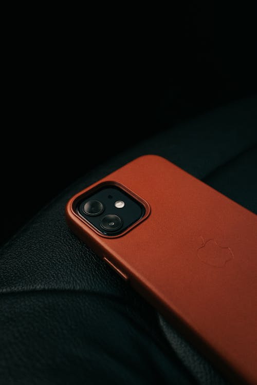 Smart Phone with a Red Case 