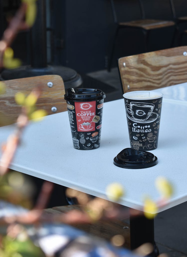 Photo Of Two Takeaway Coffee Cups On A Table