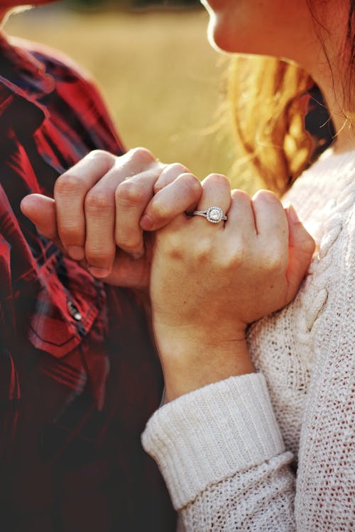 Man and Woman Holding Hands