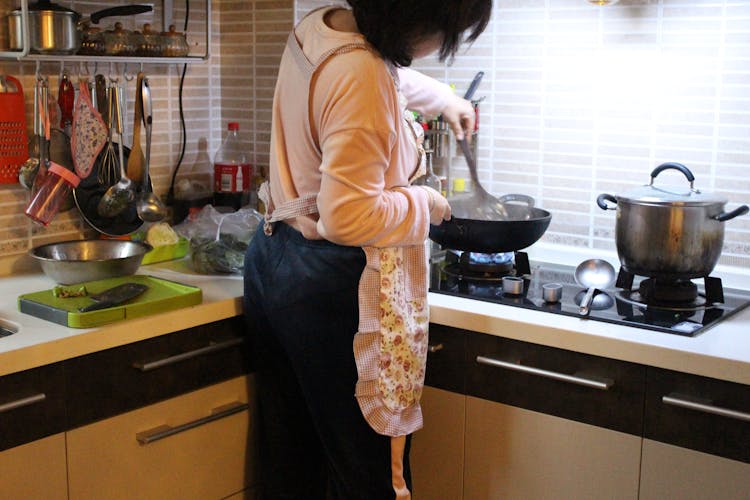 Photo Of A Woman Cooking