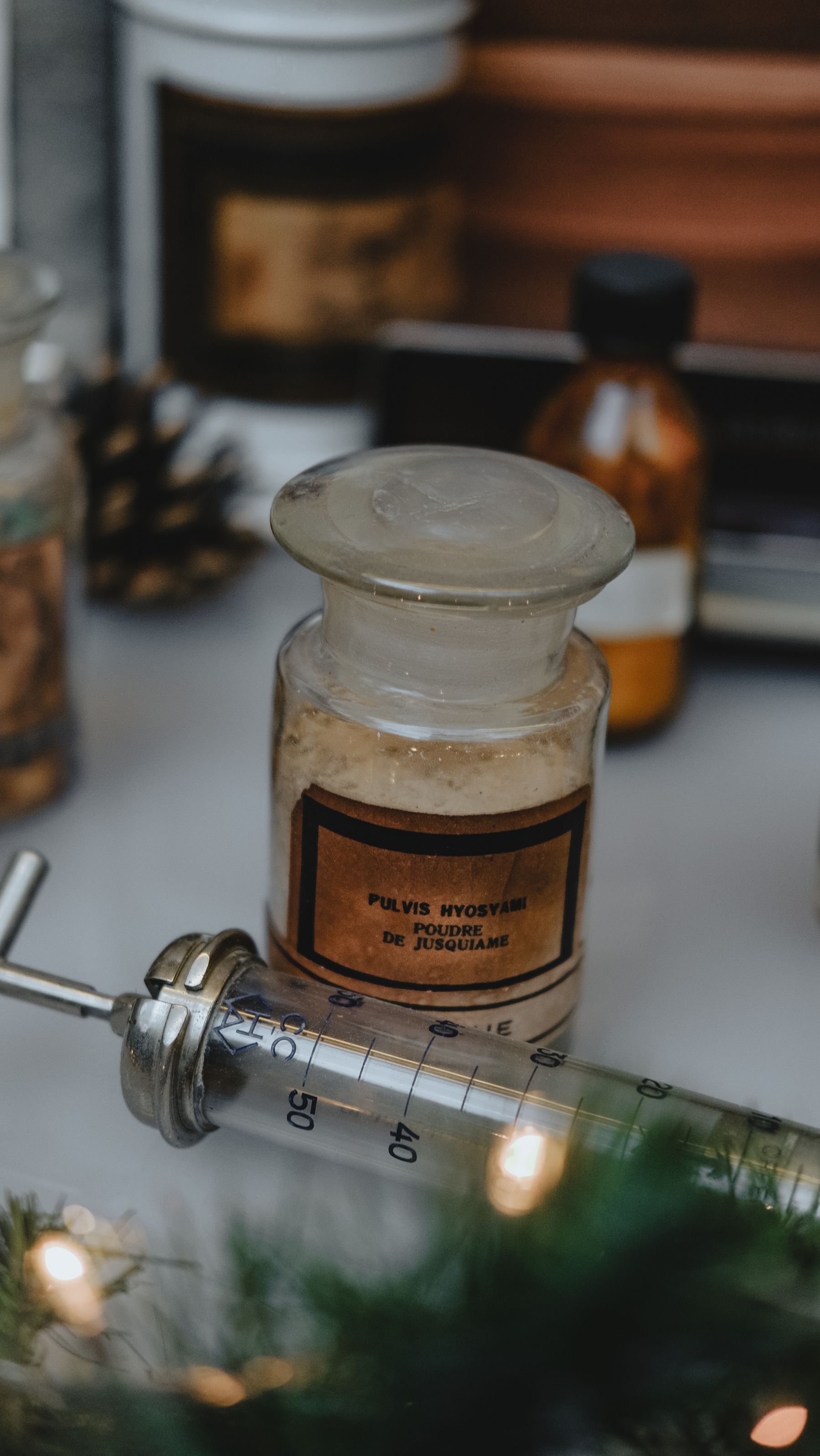 Antique apothecary jar with pharmacopoeial label