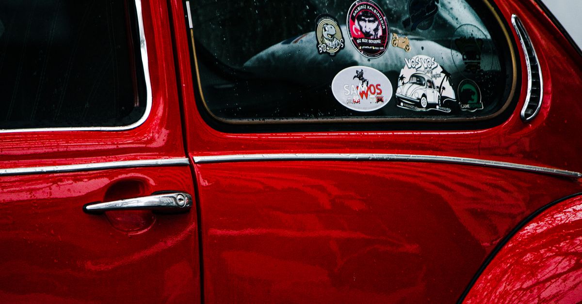 Free Vw Window Sticker Stickers on Volkswagen Beetle Window · Free Stock Photo