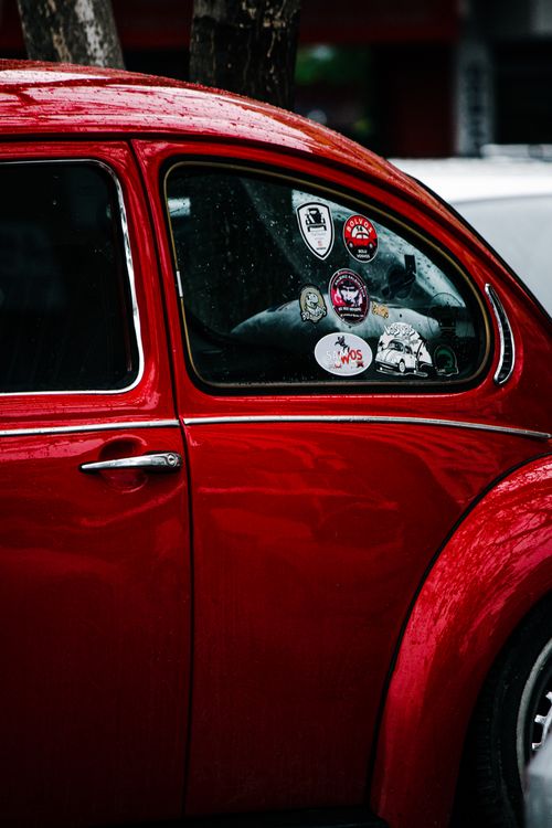 Free Vw Window Sticker Stickers on Volkswagen Beetle Window · Free Stock Photo