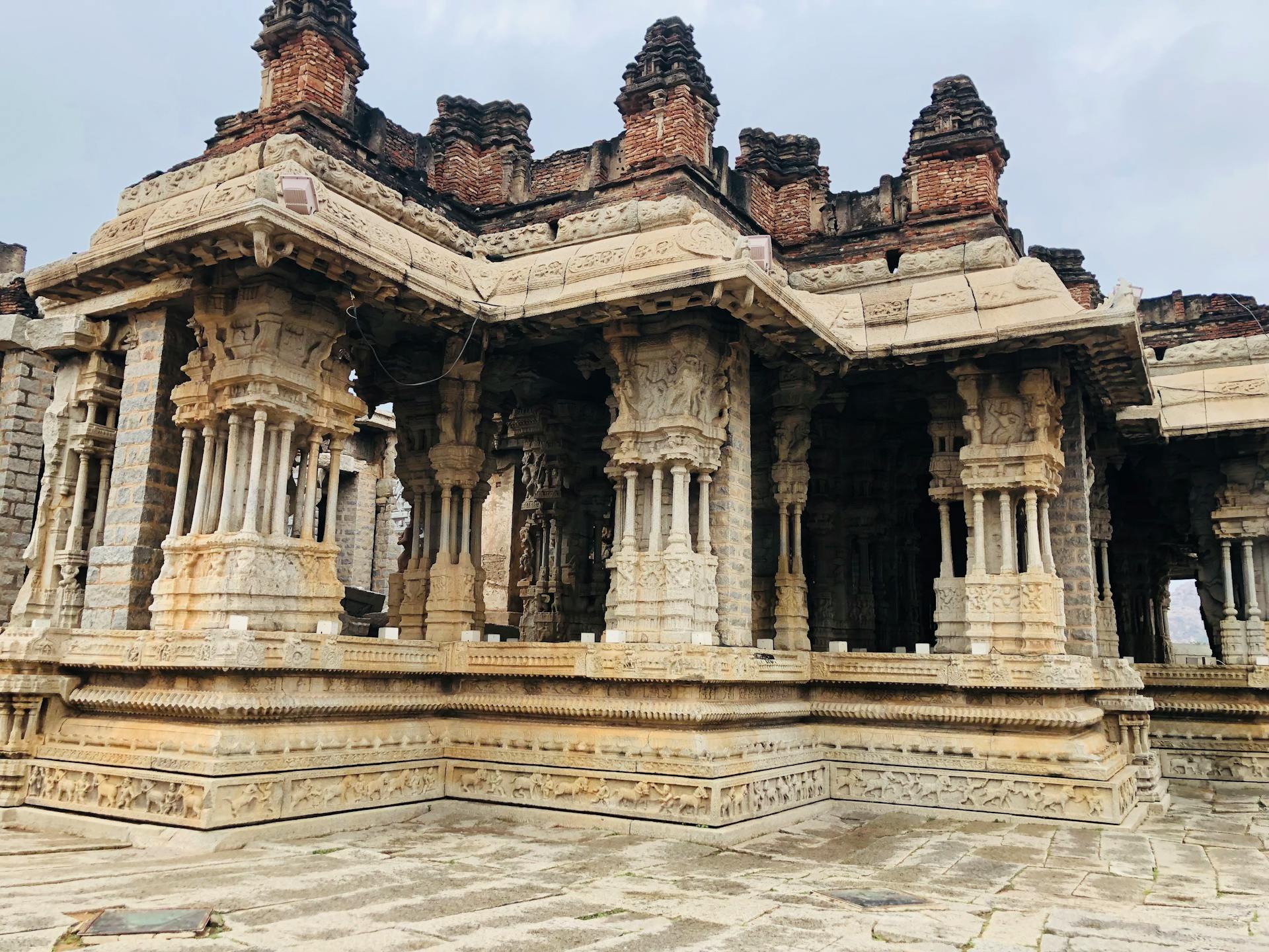 Explore the intricate stone carvings of this ancient temple showcasing Hindu architectural brilliance.