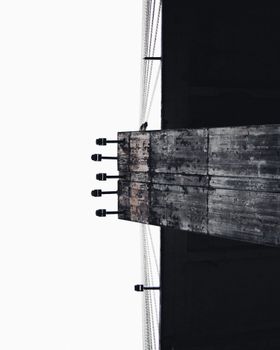 Minimalist view of an urban concrete skyscraper, offering ample copy space for text.