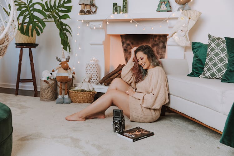 A Woman Sitting On The Floor